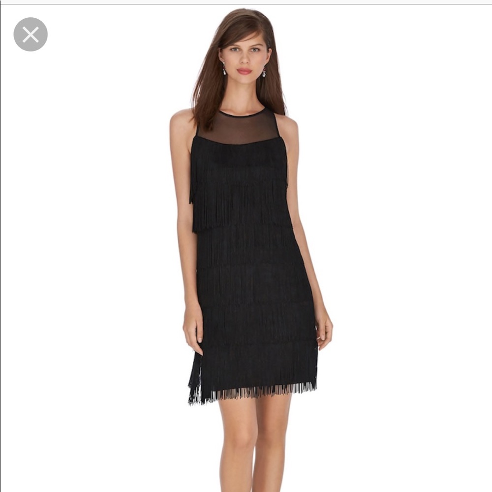 Black shift dress with layered fringe.